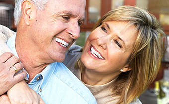older couple with dental implants